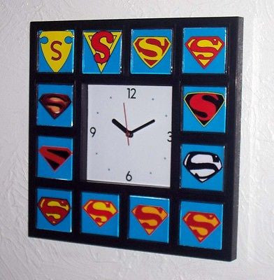History of Superman S Clock with 12 classic chest emblems s